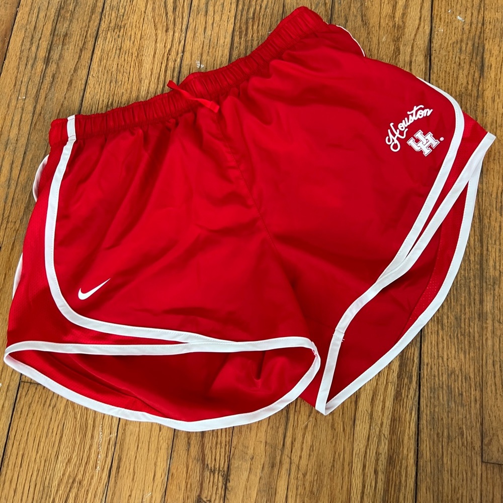 Nike dri fit women’s shorts - red and white. Houston logo and underwear sewn in.